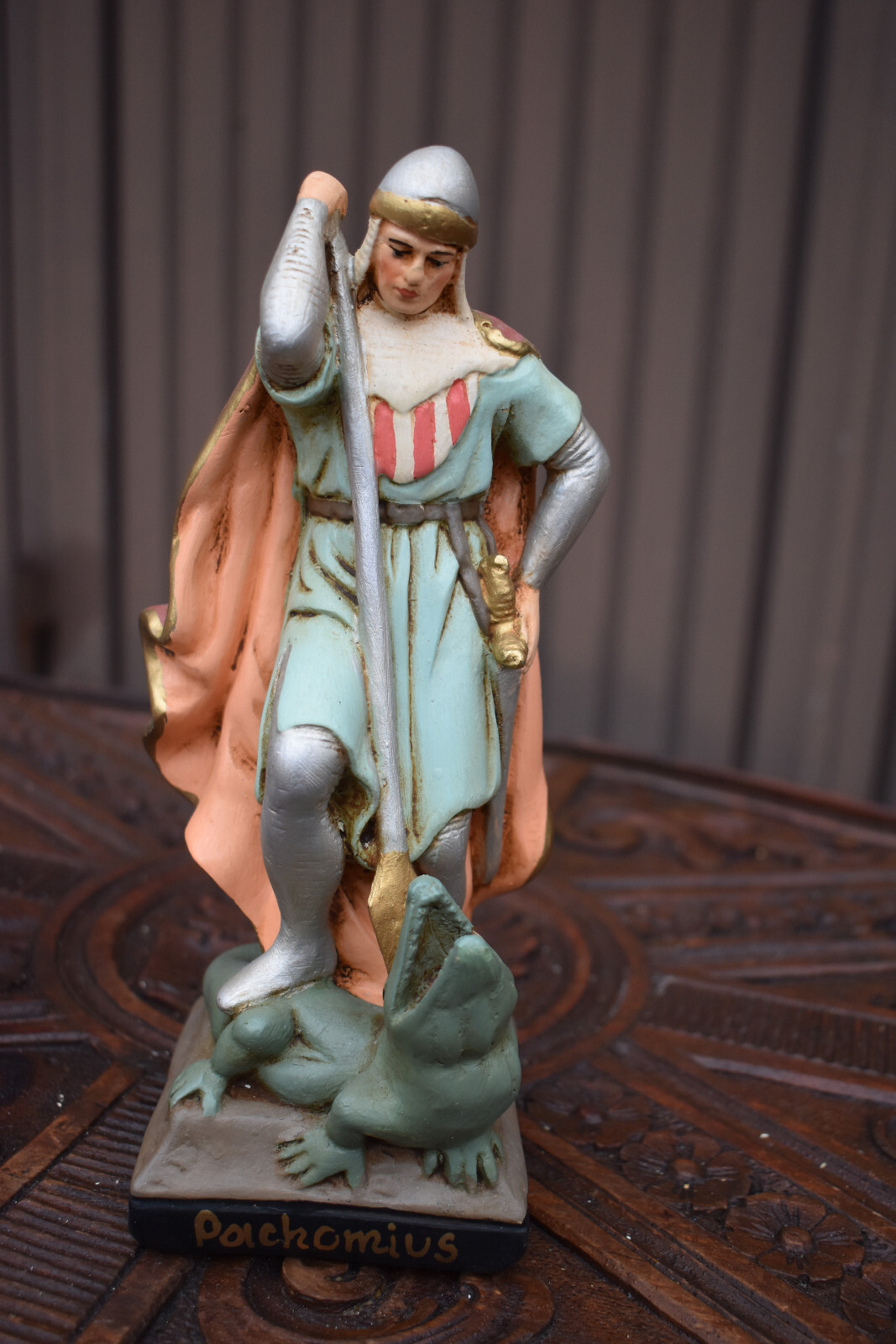 Antique chalk religious statue of Saint pachomius with crododile figurine