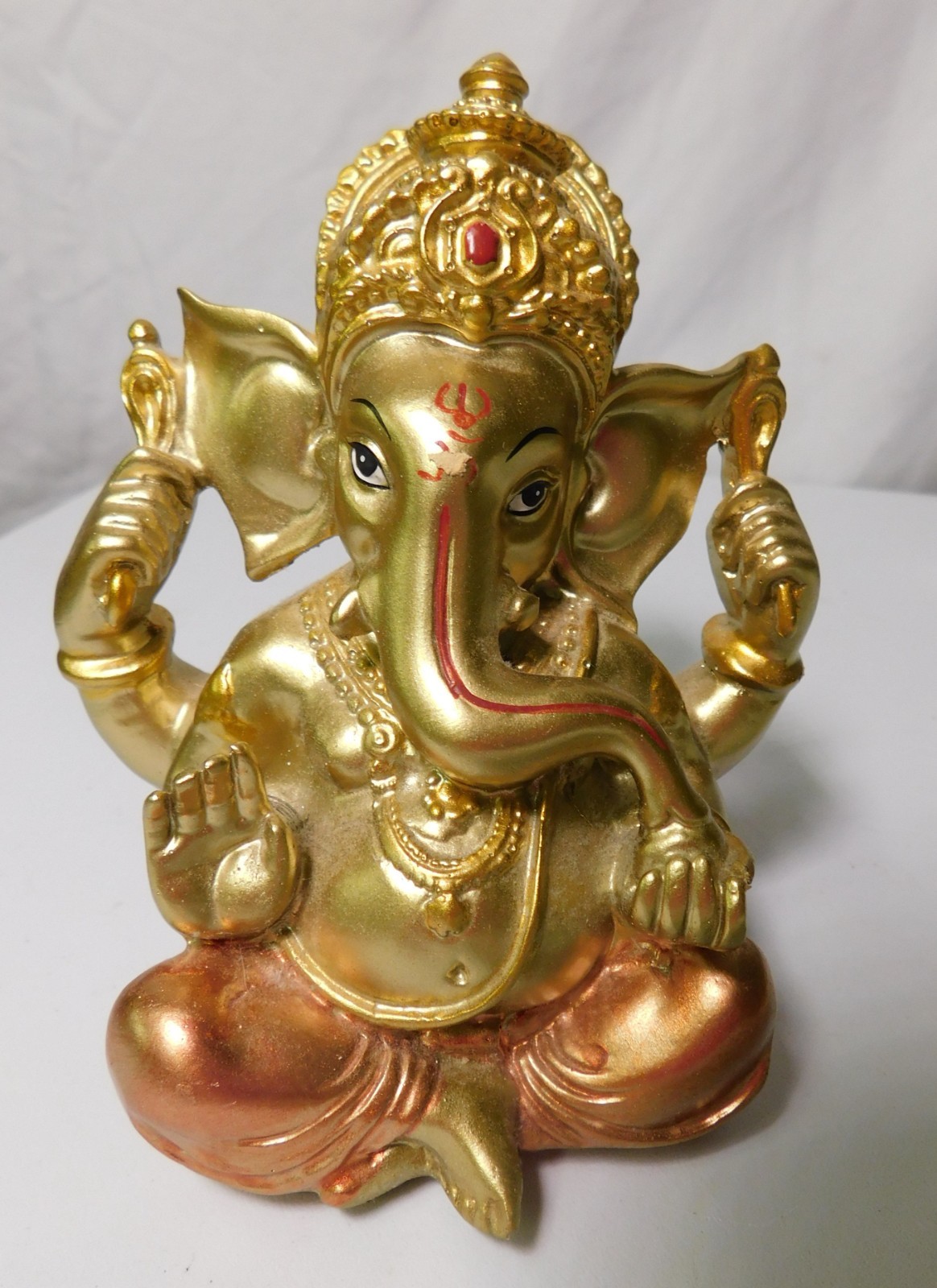 RESIN LORD GANESH STATUE 5 1/2 INCH TALL GOLD AND ROSEGOLD TONES